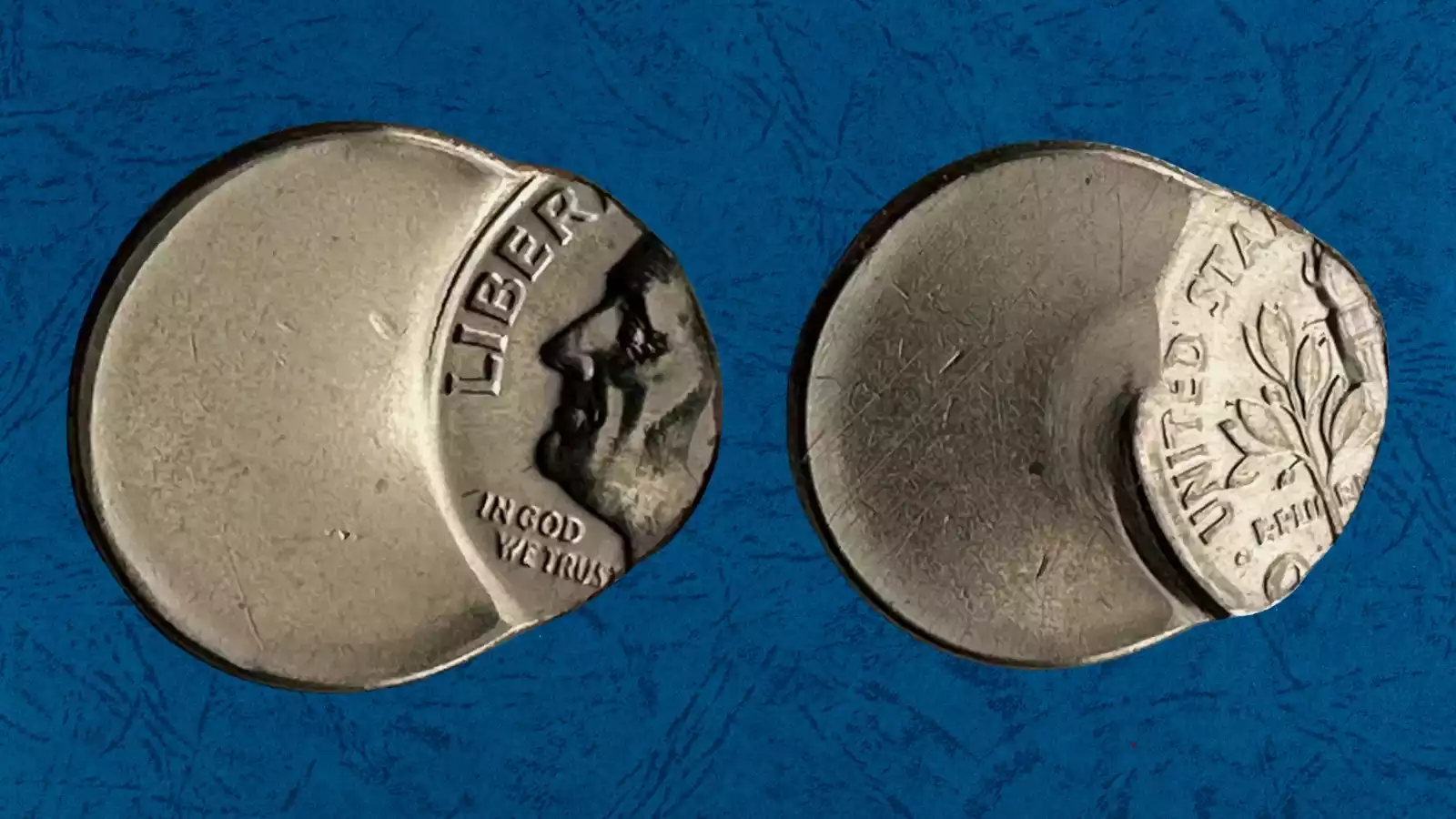 2021 Roosevelt dime off-center strike error showing design shifted to one side with blank metal visible